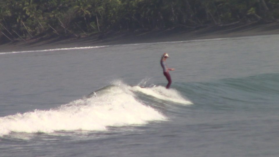 Jackie George, surf with amigas, long boarding, shredding, Costa Rica, surf camp, women surf yoga retreat